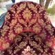 Velvet toad with backrest and firm seat in burgundy red color