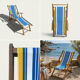 Vintage deck chair with blue and yellow striped fabric, original patina.