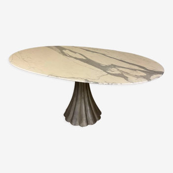 Oval marble dining table with iron base
