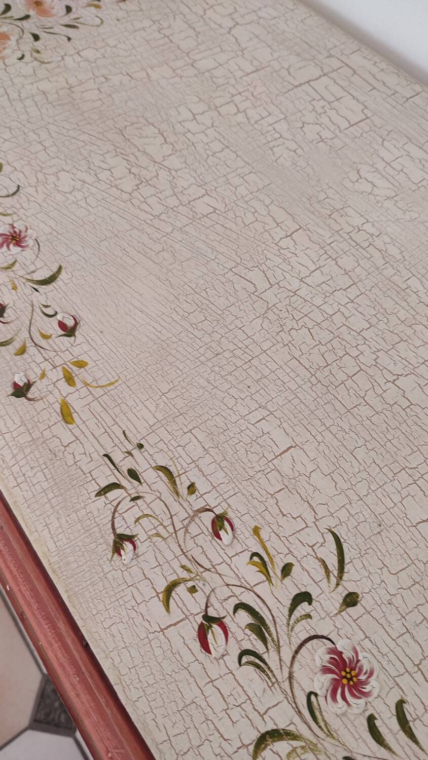 Painted chest of drawers with floral decoration