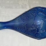 Blue glass bottle, engraved molded