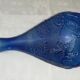Blue glass bottle, engraved molded