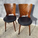 Pair of Dove chairs • Baumann • Black faux leather