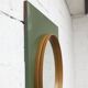 Unusual round wall mirror, 60 cm, teak edge on a green rectangular board, 1960s