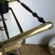 Vintage rolling golden and black dessert in brass and glass