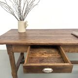 Authentic French farmhouse table from 1890 in solid oak with two drawers.