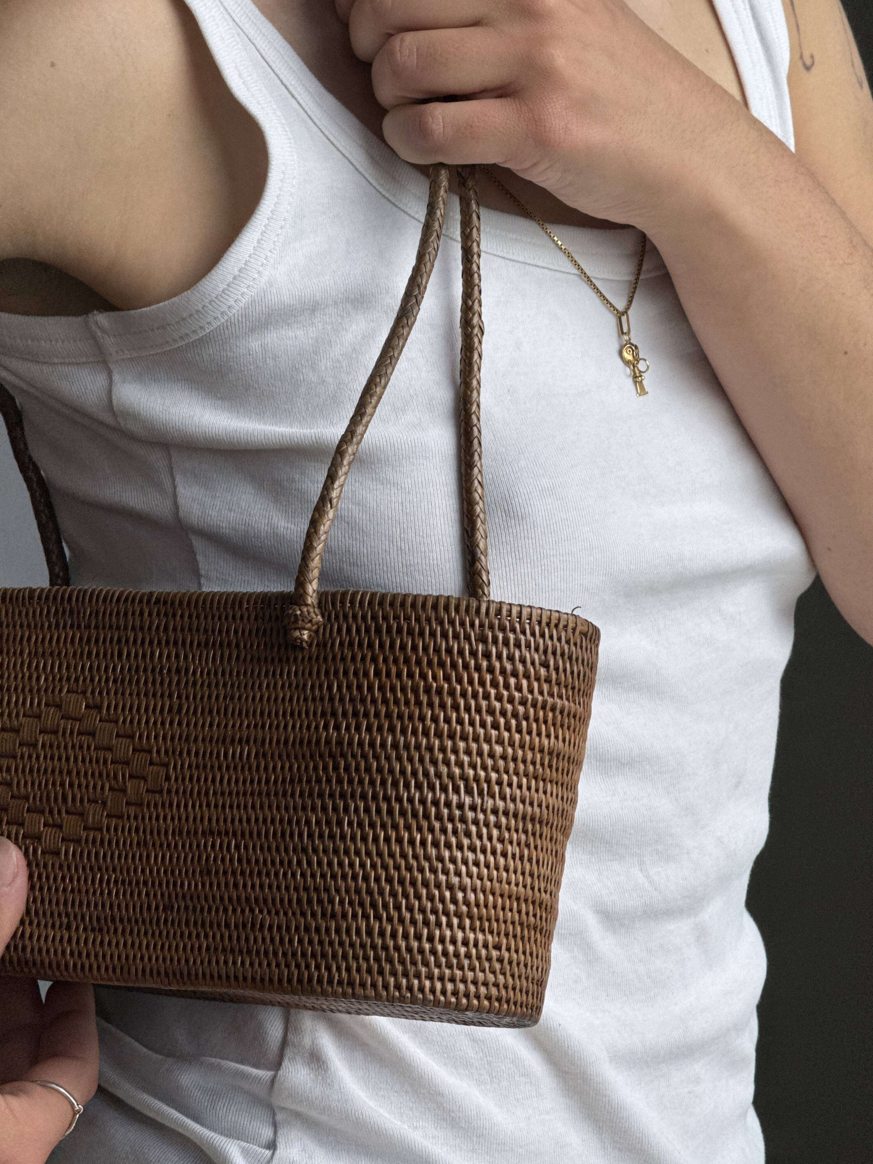 Small oval basket with long handles, traditional Indonesian L28xH10