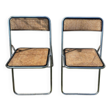 Pair of vintage metal caned folding chairs