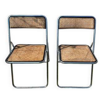 Pair of vintage metal caned folding chairs