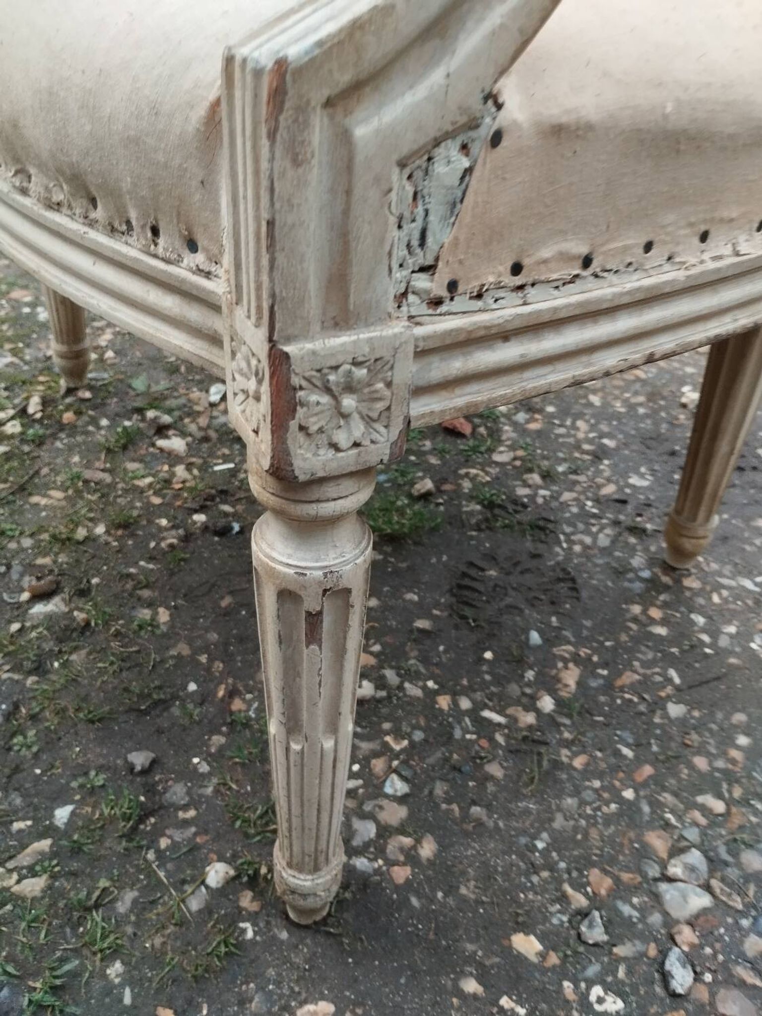 Antique armchair in Louis XVI style from the late 19th century.