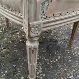 Antique armchair in Louis XVI style from the late 19th century.