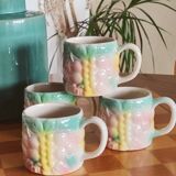 Set of 4 vintage multicoloured slipware coffee cups.