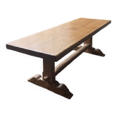 Large antique farmhouse table made of solid wood, in monastery style.