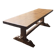 Large antique farmhouse table made of solid wood, in monastery style.
