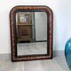 Antique Louis-Philippe mirror in blackened wood with a burl effect – 67x52 cm