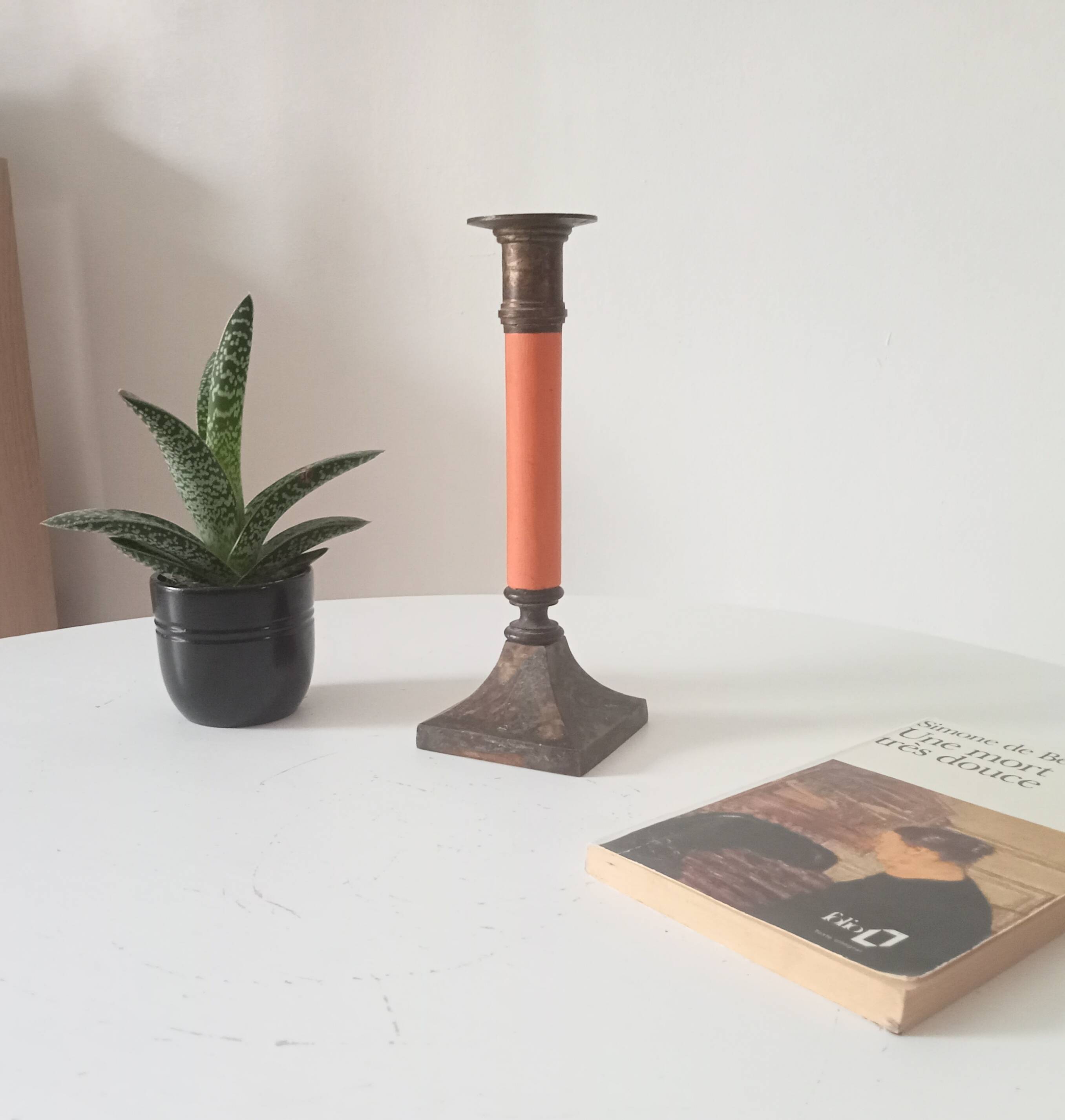 Vintage candlestick in solid gilded brass and orange wood.