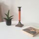Vintage candlestick in solid gilded brass and orange wood.