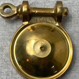 Brass ashtray in the shape of a boat shackle