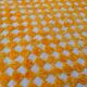 Yellow and white checkered Berber rug