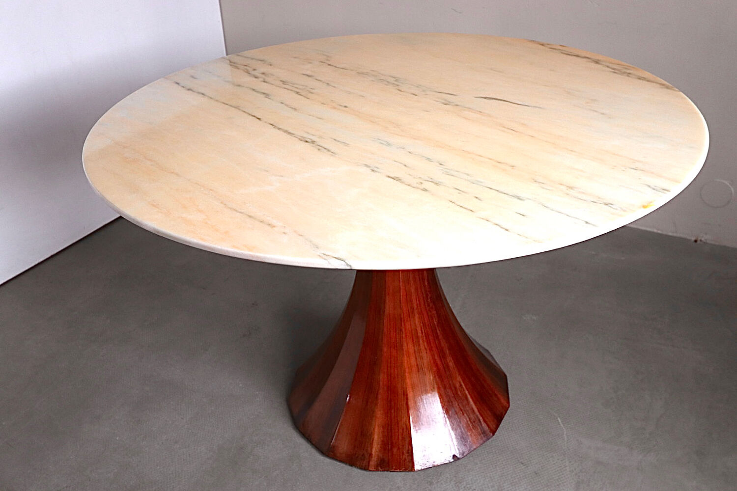 Marble and rosewood round dining table