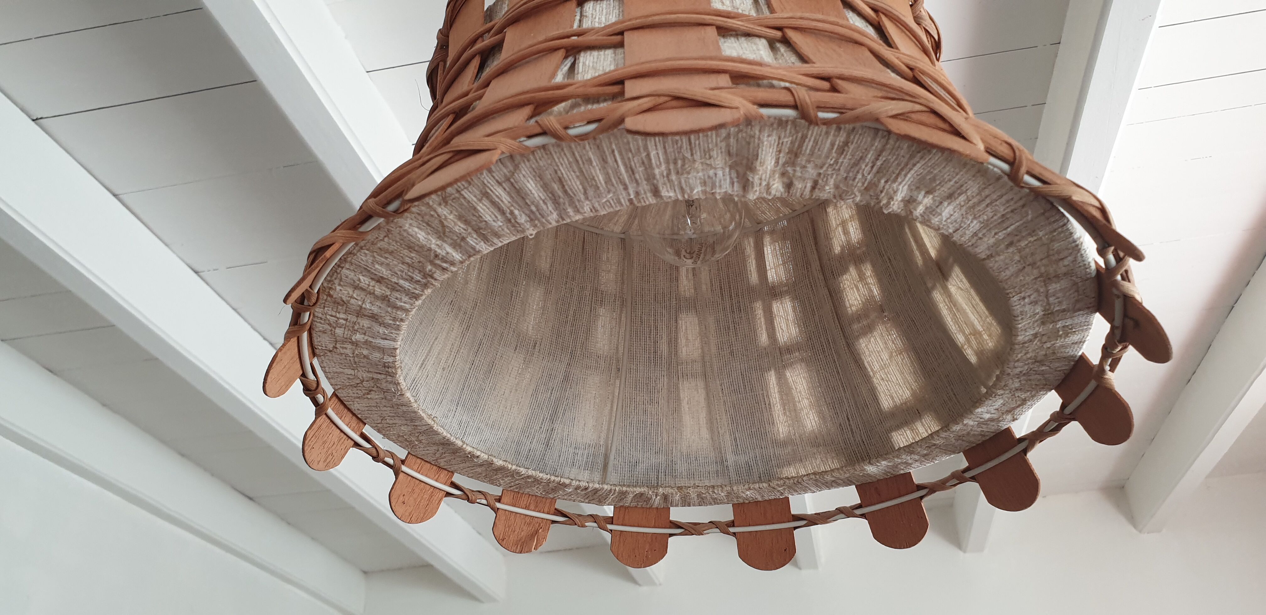 Rattan and wood suspension