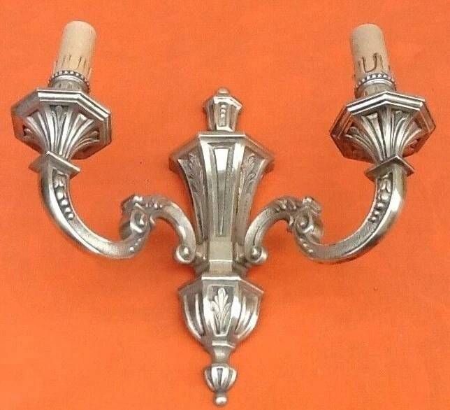 Large wall sconce in LXV style, patinated bronze.