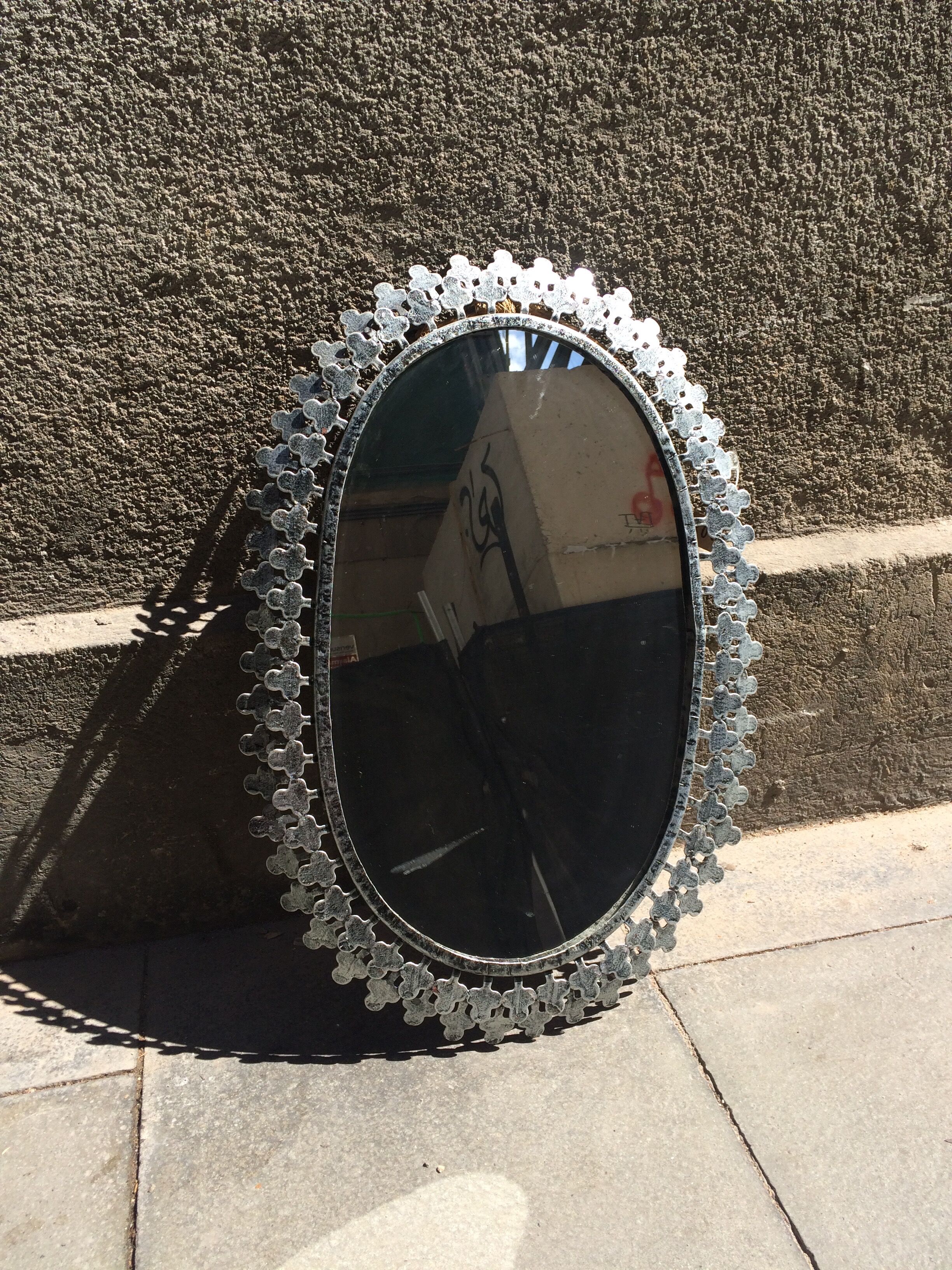 Metal oval mirror