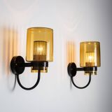 Pair of black metal wall lamps with yellow shades and inner diffuser