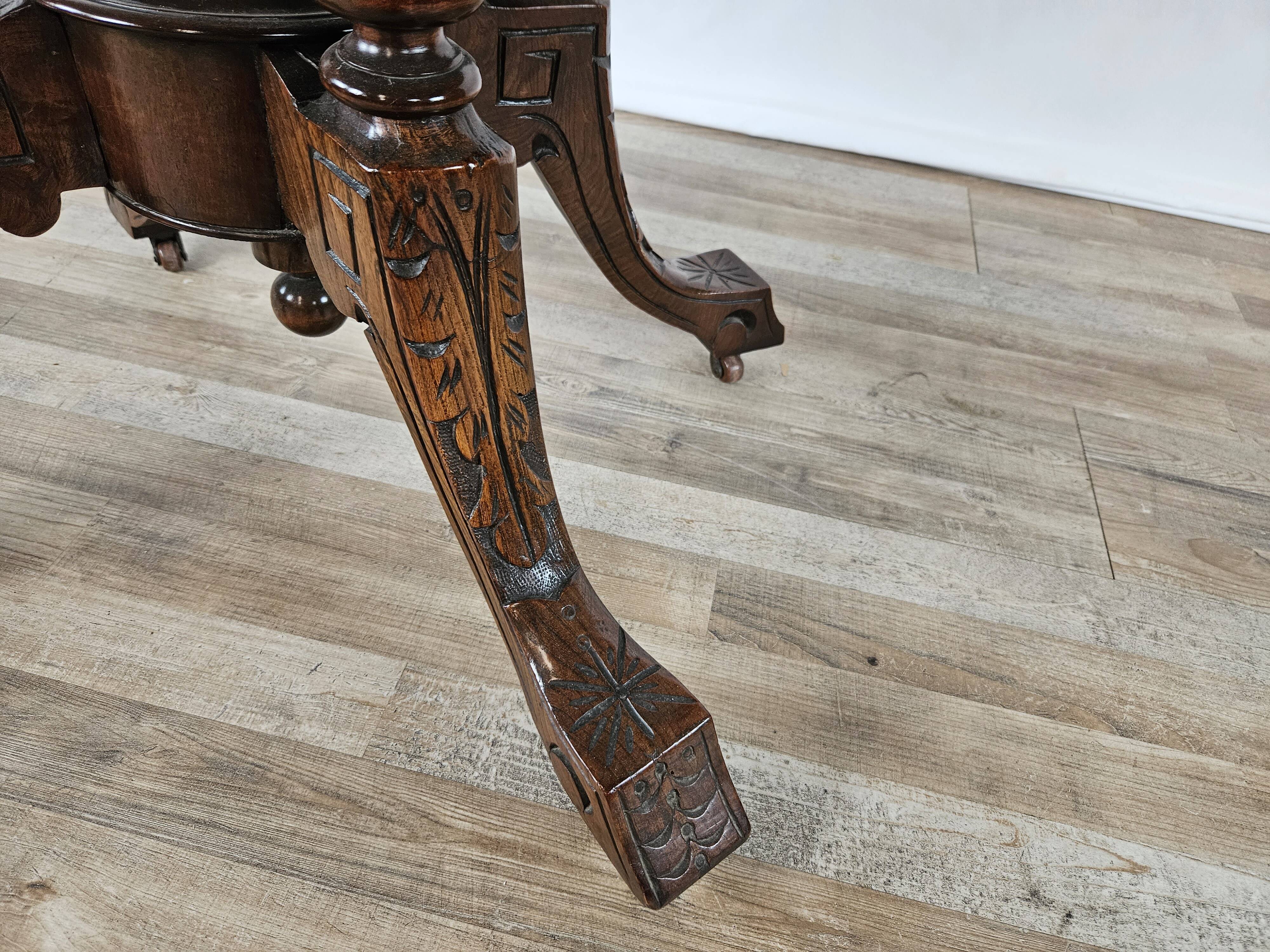 Coffee table in walnut with maple inlays and wheels