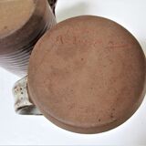 Two enamelled sandstone mugs Roger Jacques handwritten signature