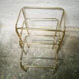 Trio of nesting tables in gold metal
