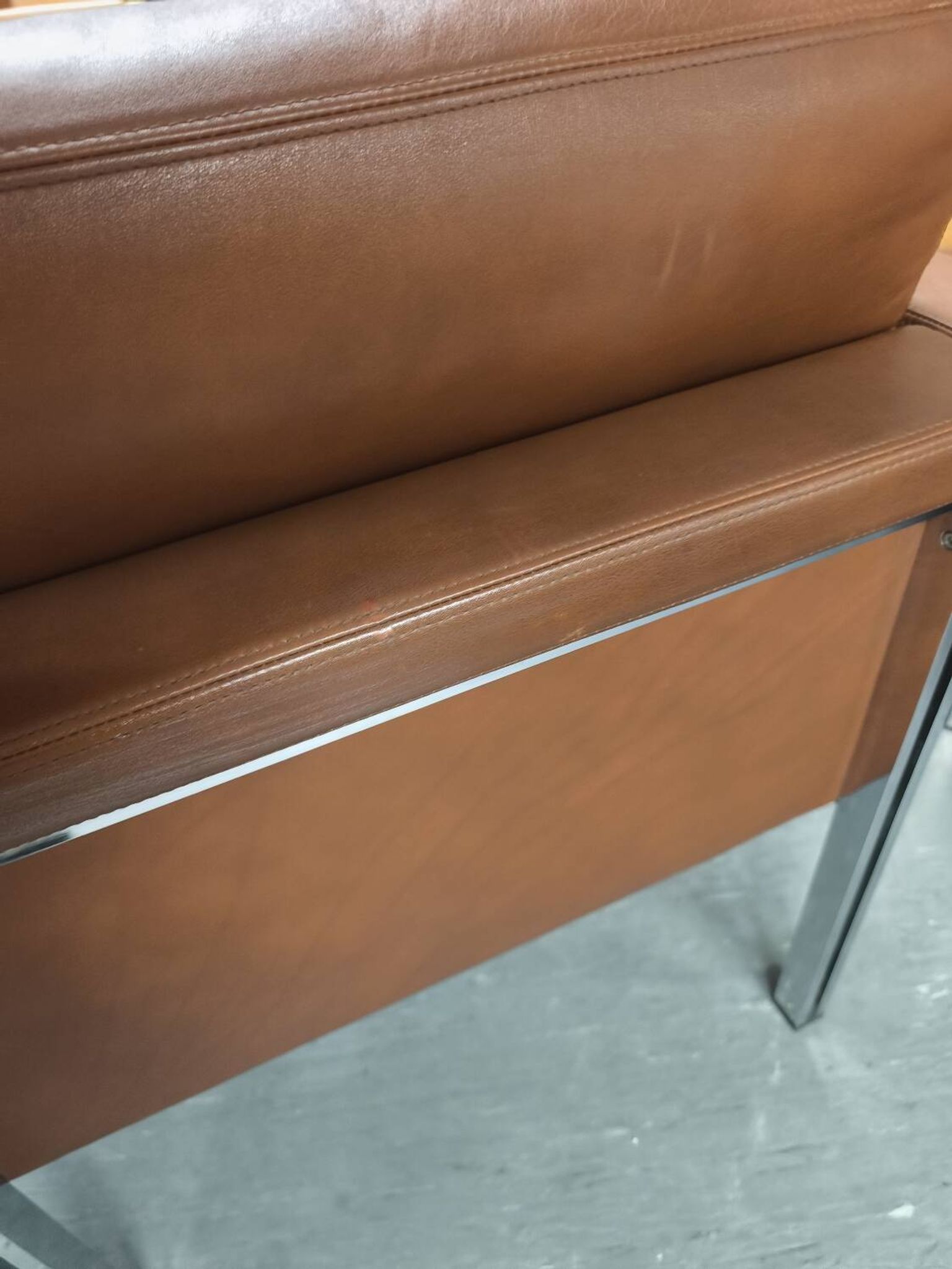 Leather armchair, 1970s, manufacturer Sitag, cognac brown leather.