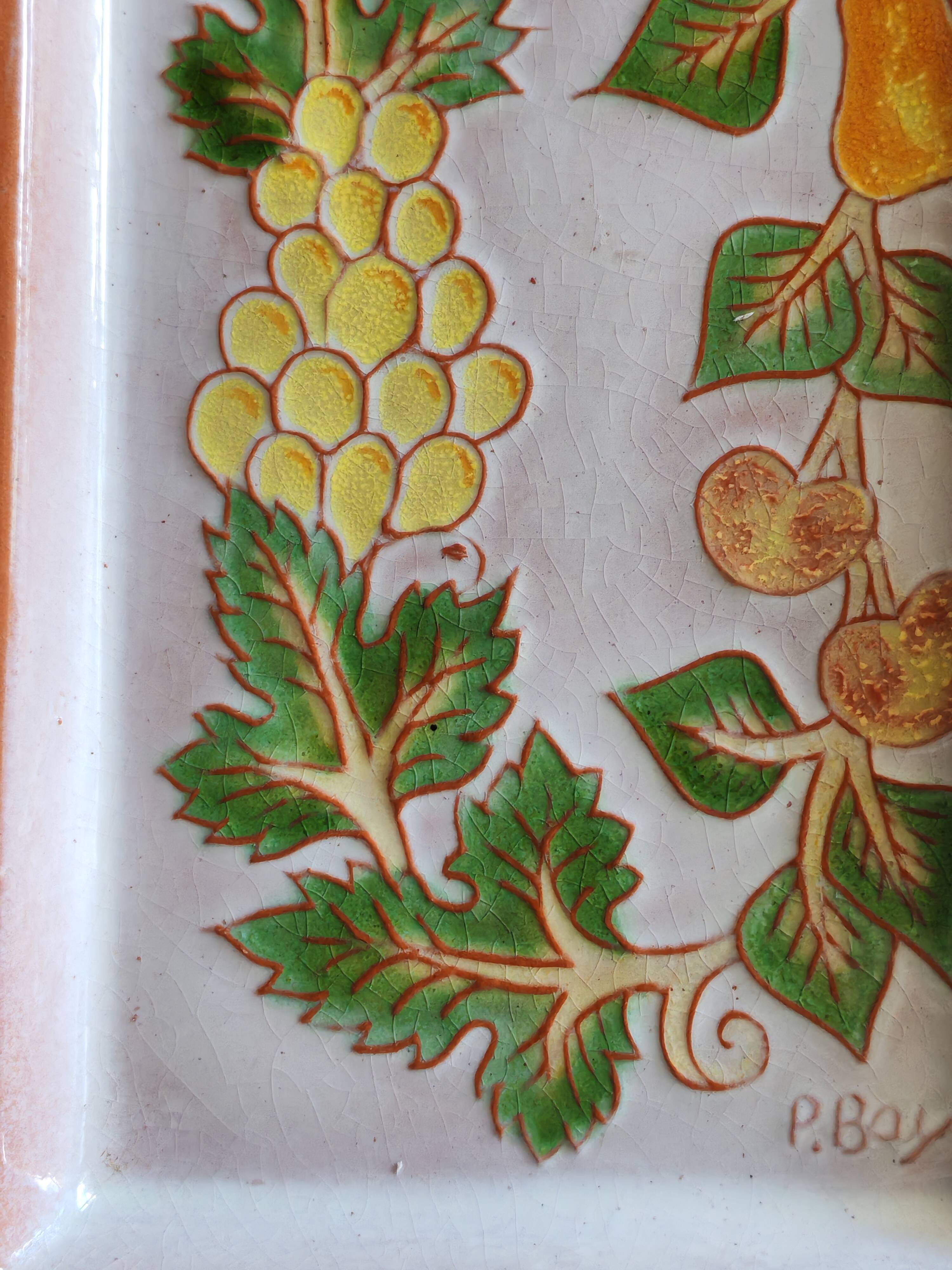 Terracotta plate signed P.Boy, glazed artisanal ceramics.