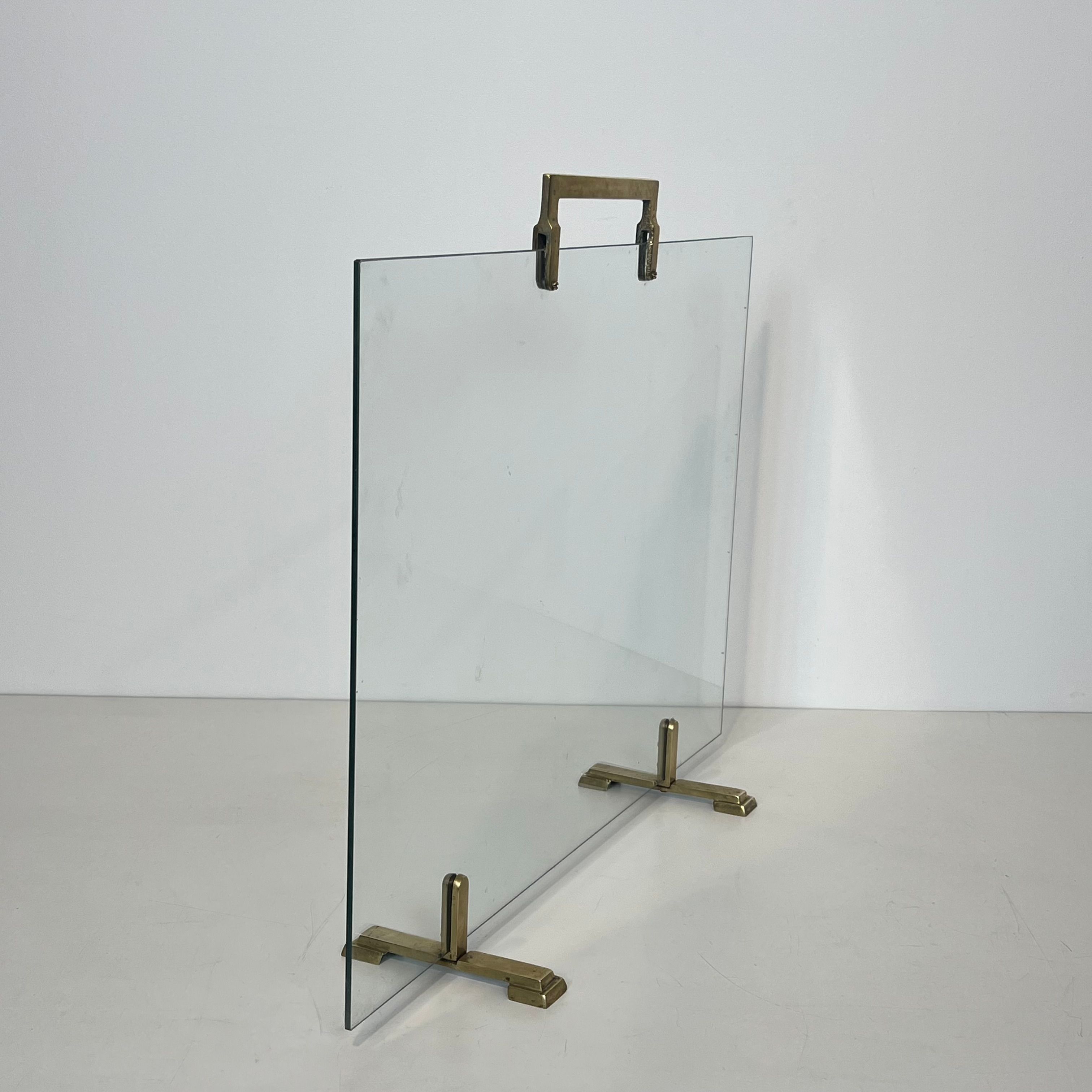 Glass and brass fire screen