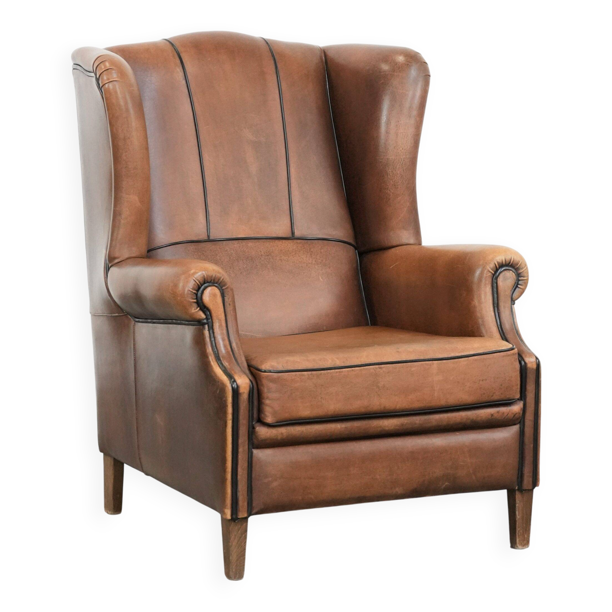 Sheepskin wingback armchair with beautiful colours in good condition