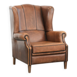 Sheepskin wingback armchair with beautiful colours in good condition