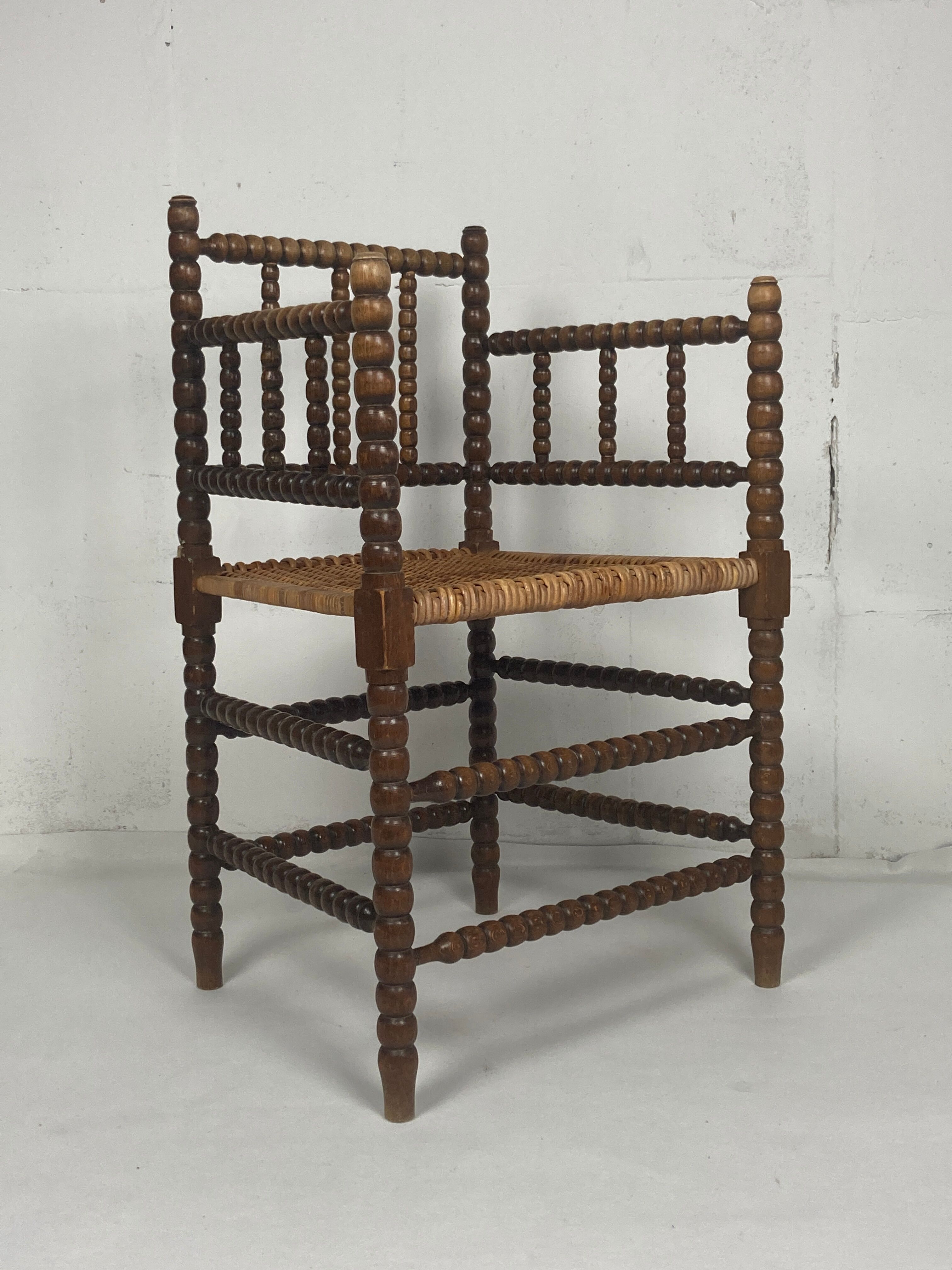 Fauteuil en osier et en bois tourné, années 1930 - 1950