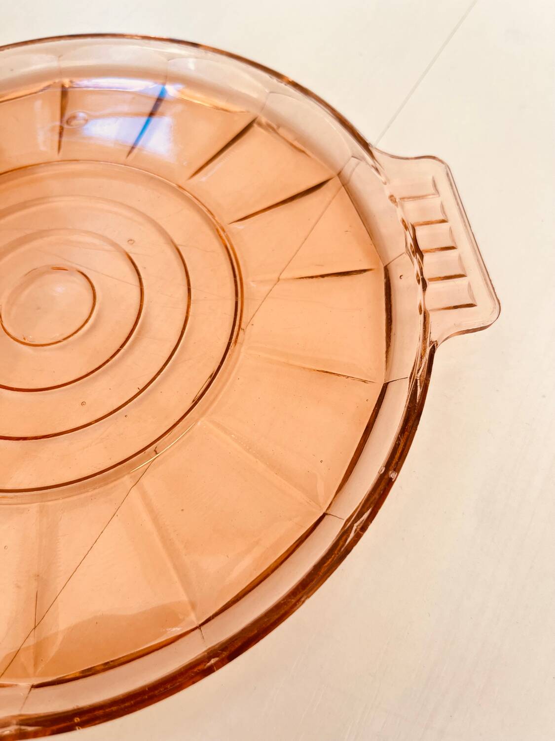 Round pink molded glass tray