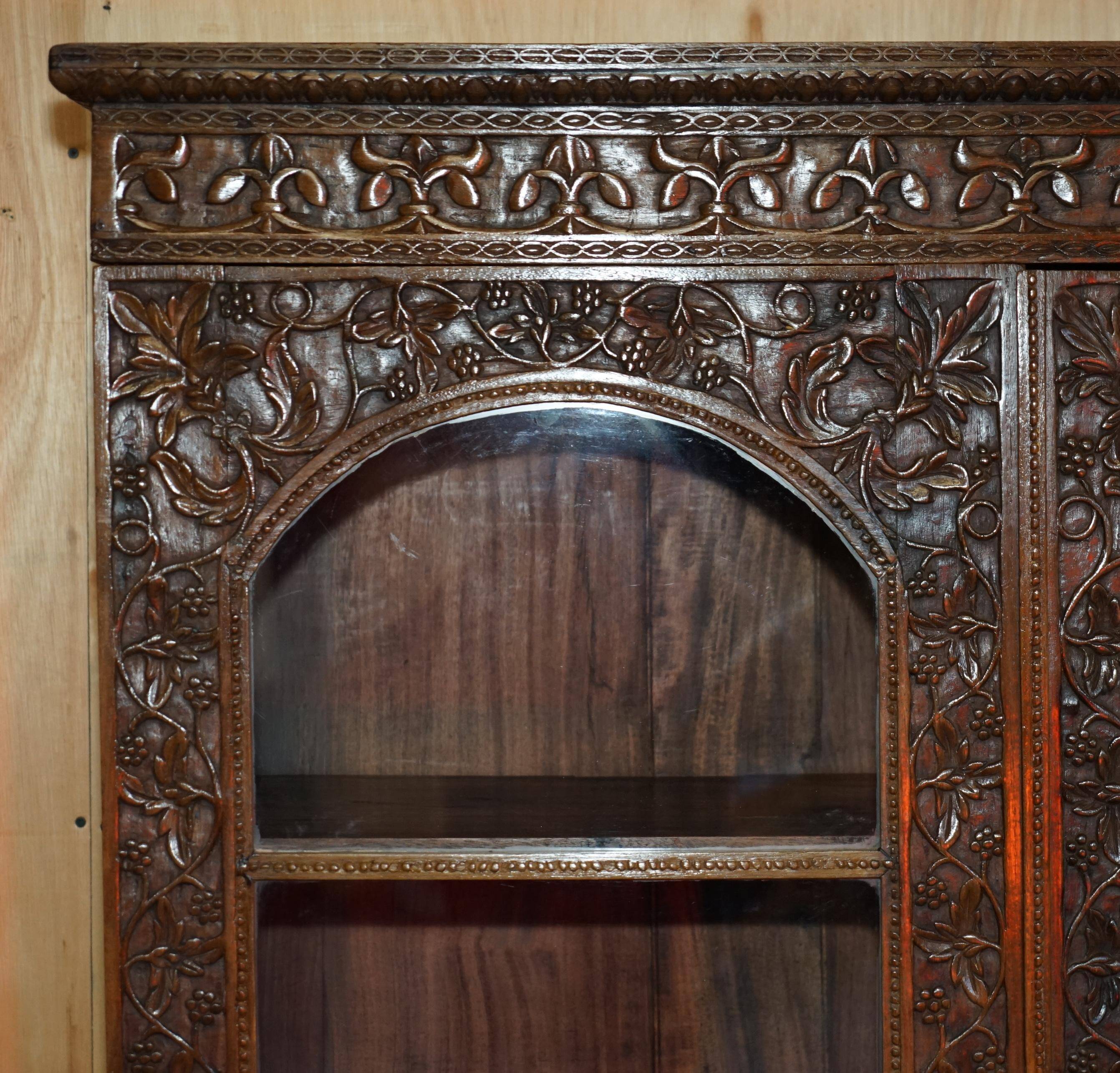 19th-century Anglo-Indian colonial hardwood library on a chest of drawers.