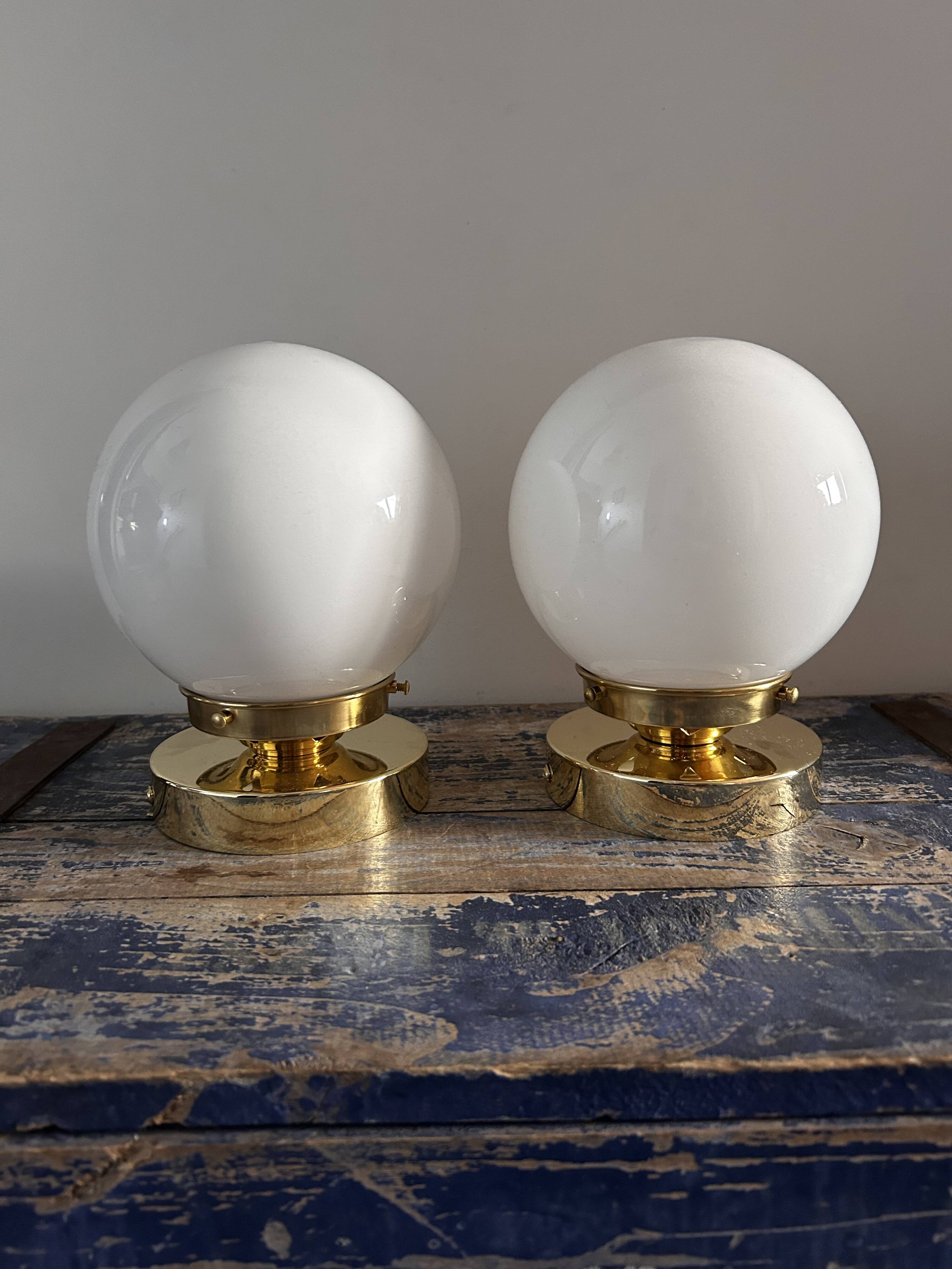 Set of white opaline globe sconces