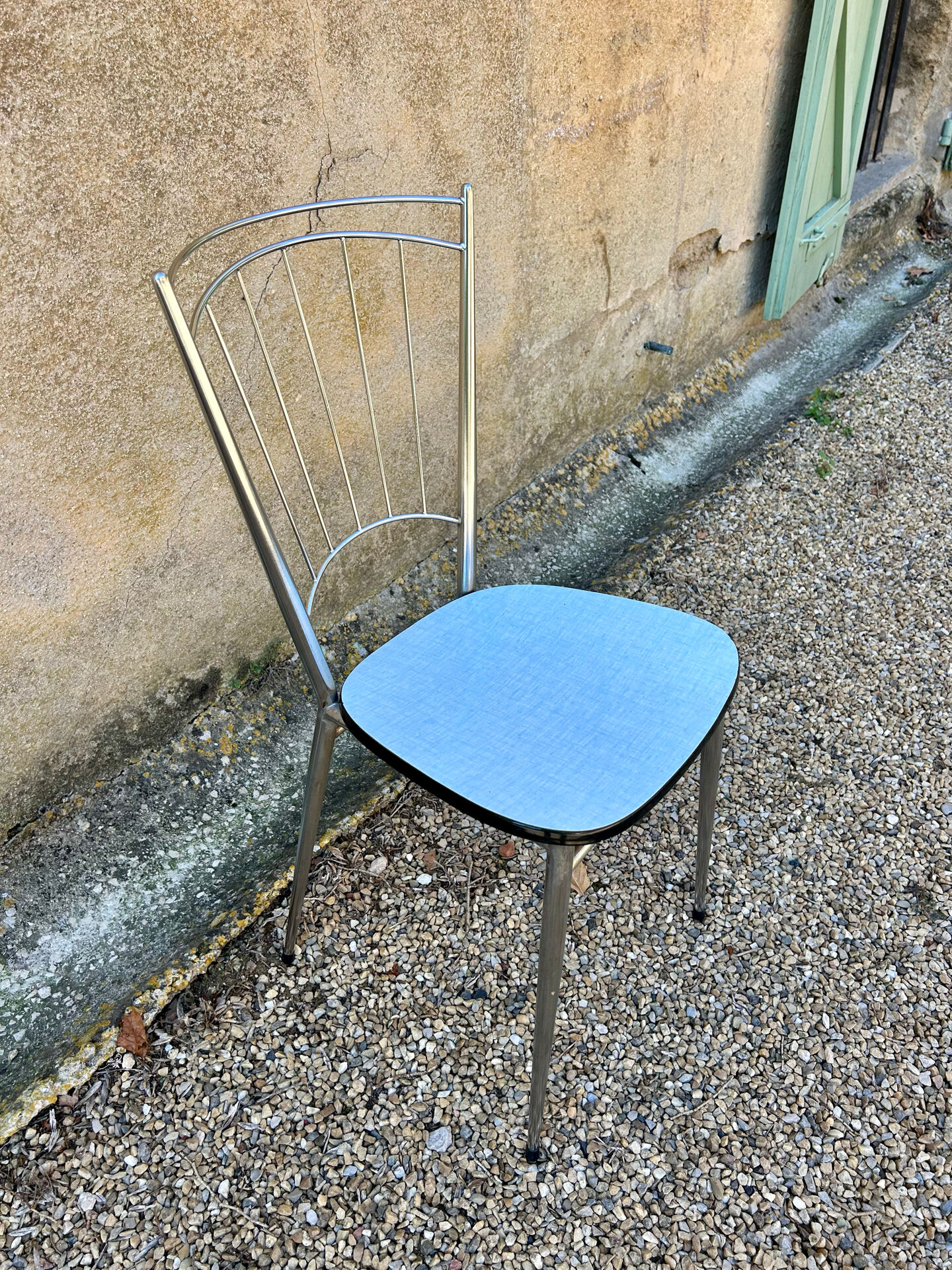 Chrome chair with blue Formica