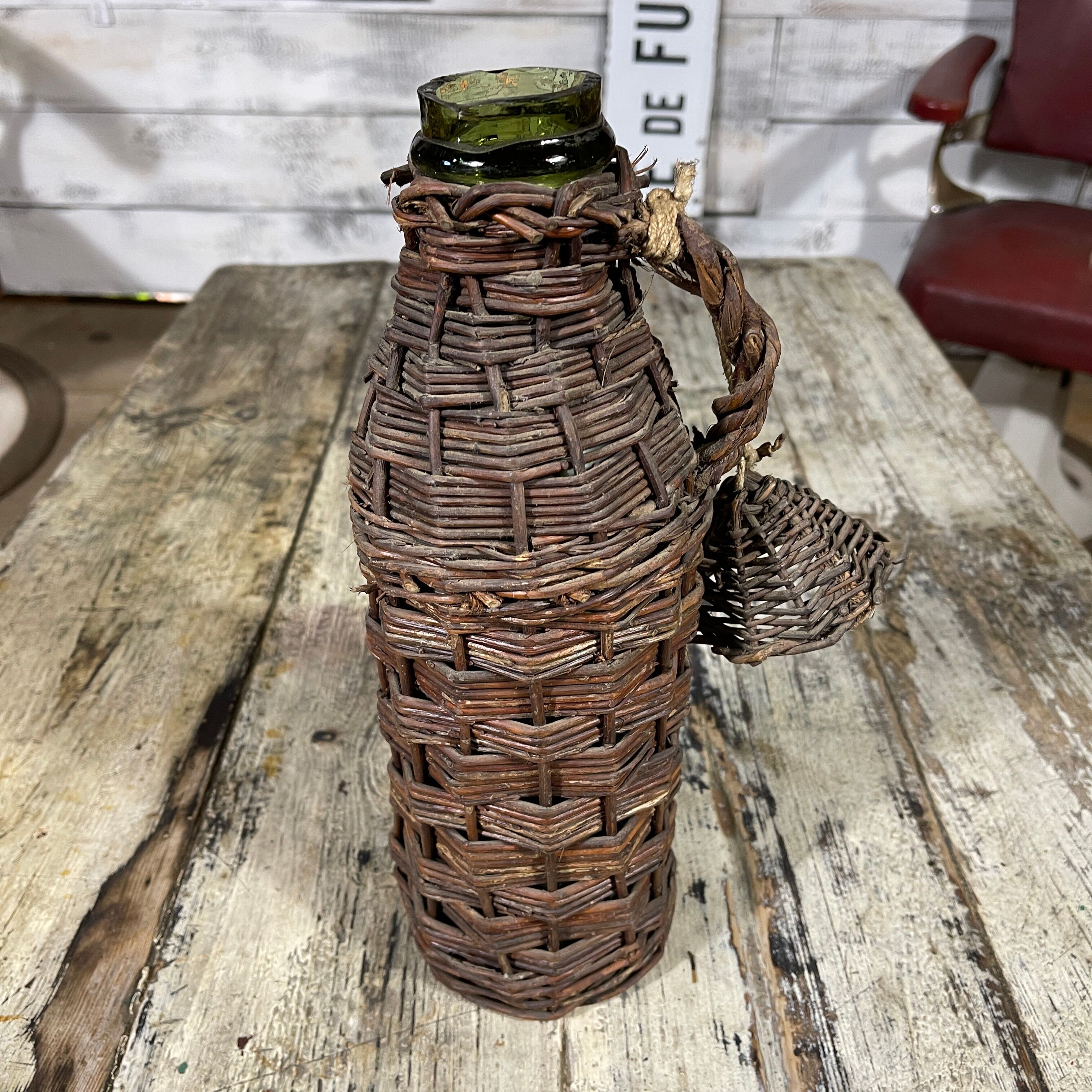 Green wicker bottle