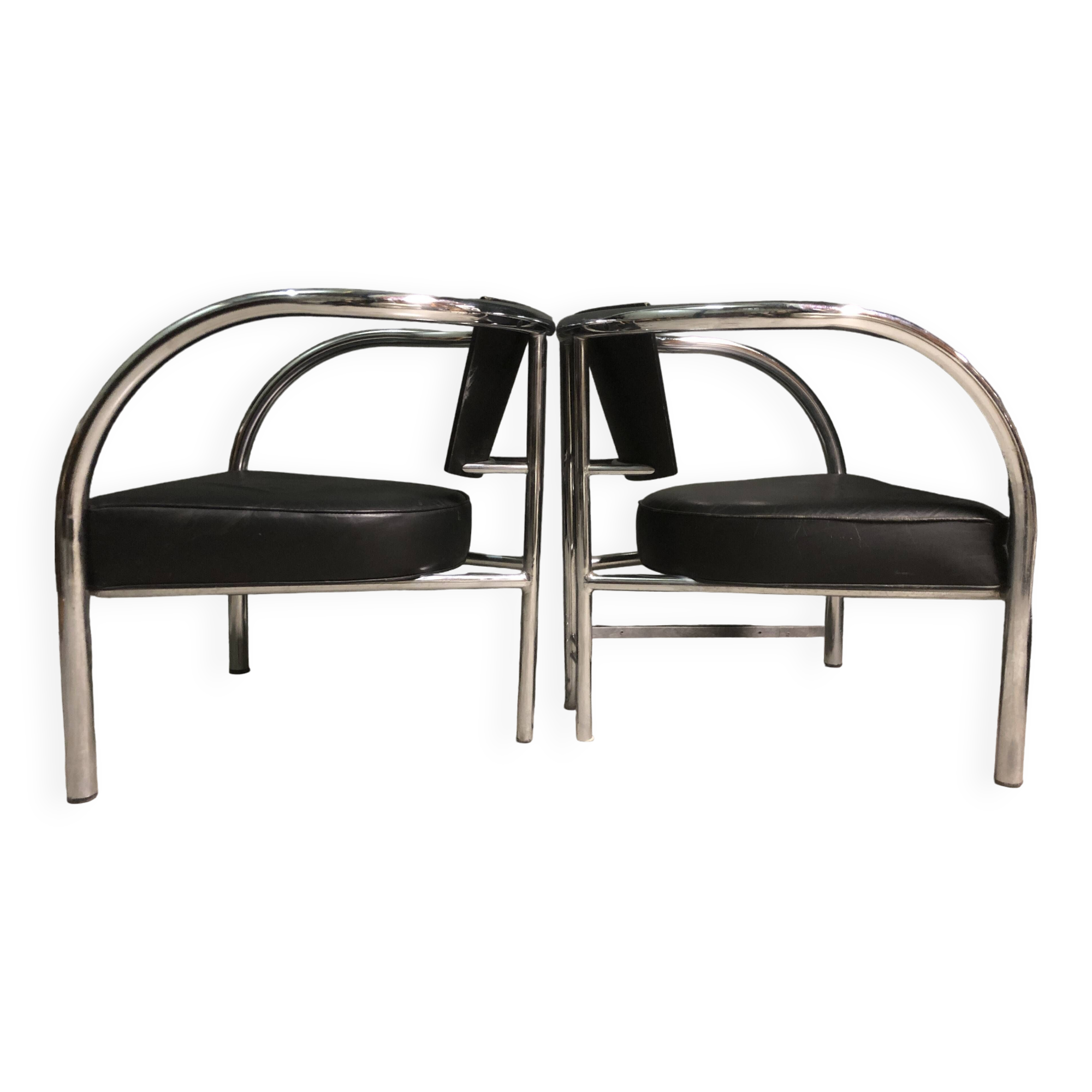 A pair of petite low armchairs by ronald cecil sportes for lumen center, 1987