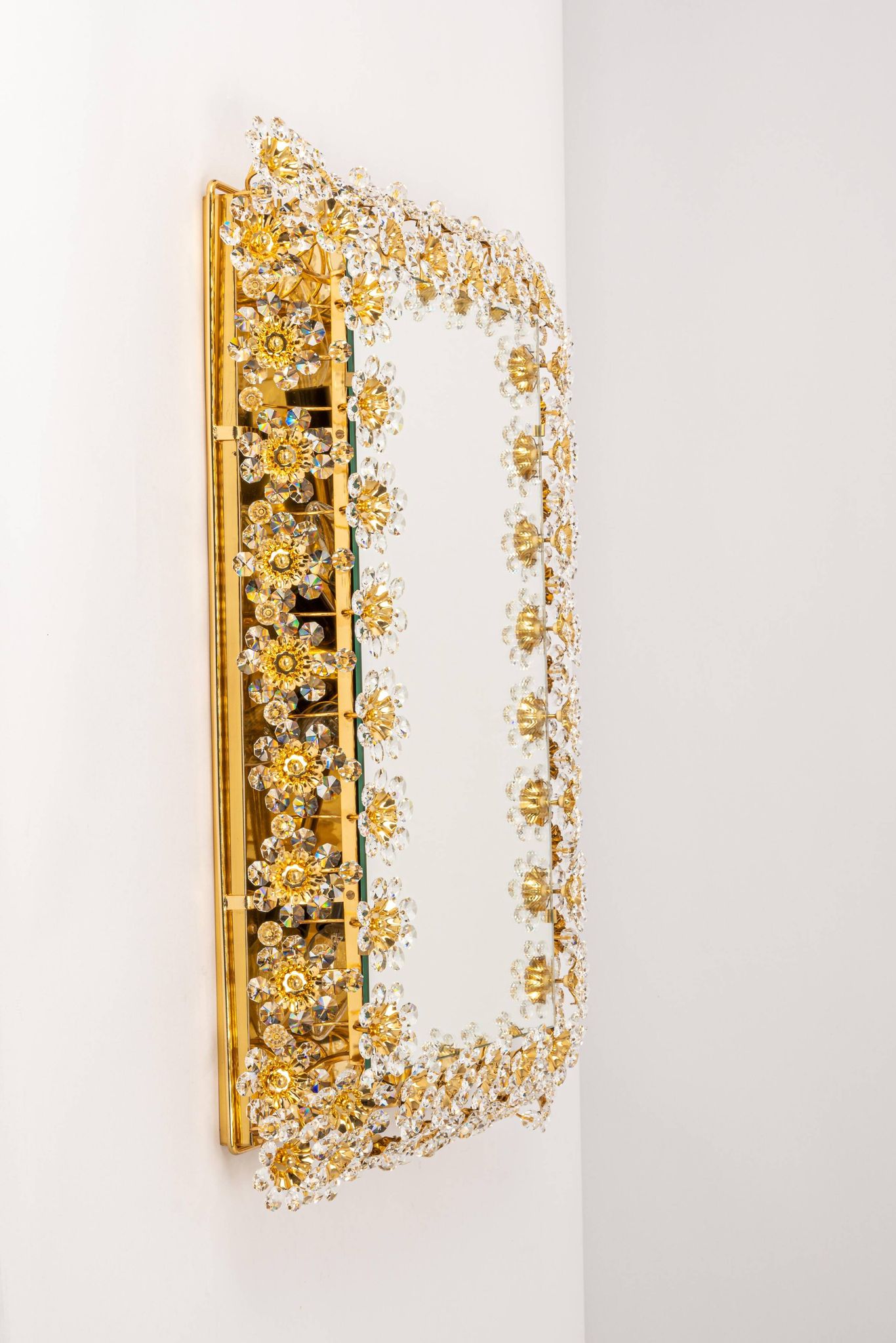 Spectacular backlit mirror in gilded brass and crystal glass by Palwa, Germany.