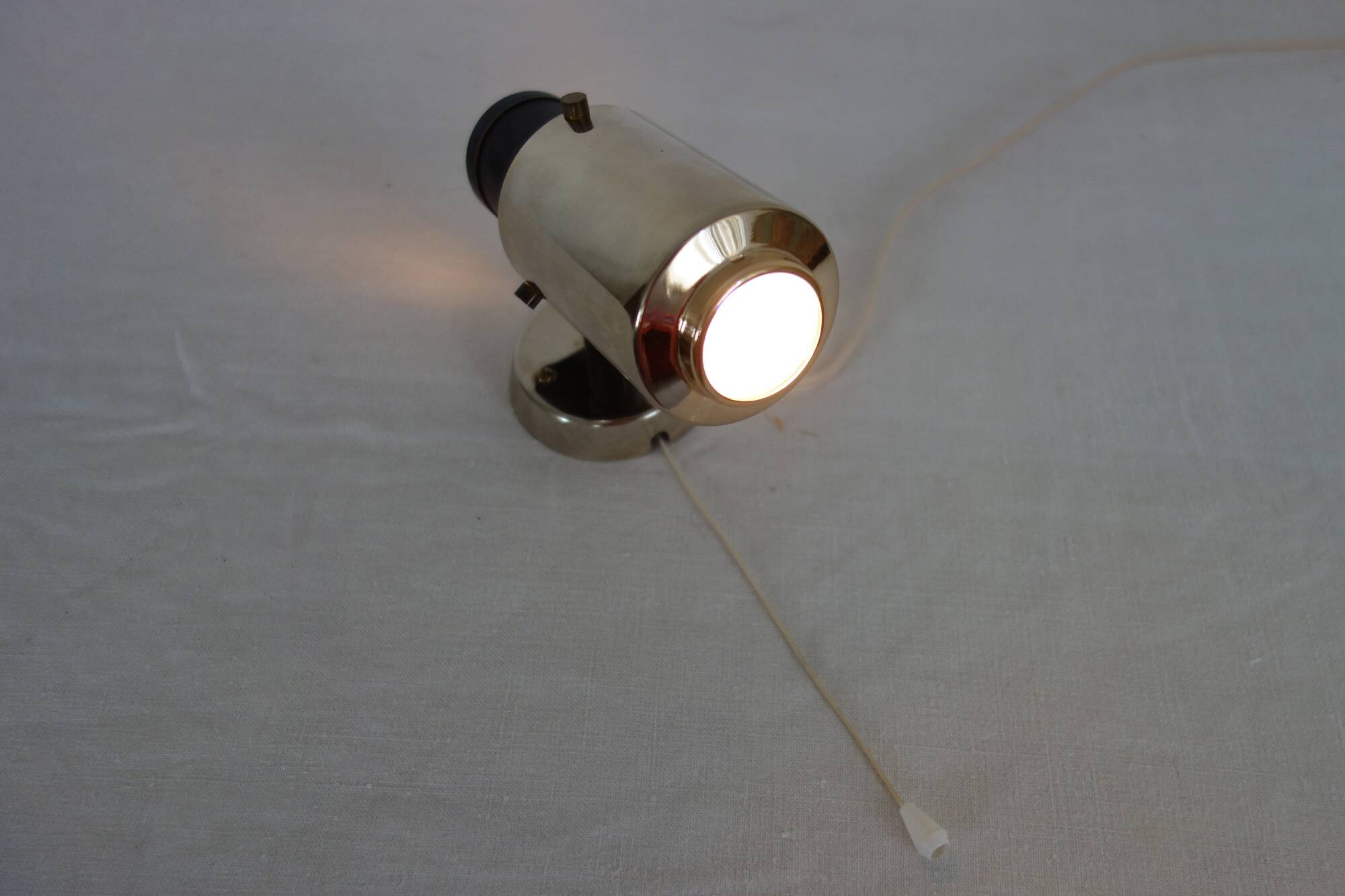 2 Zodiac wall lights by Jacques Biny from the 1950s.