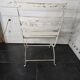 Old wrought iron and wood garden armchair