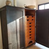 Old black wardrobe - wooden drawers and labels of origin