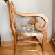 19th century St Empire armchair in pegged blond walnut with cross-stitched tapestries