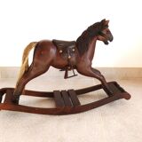 Ancien cheval à bascule en bois et cuir