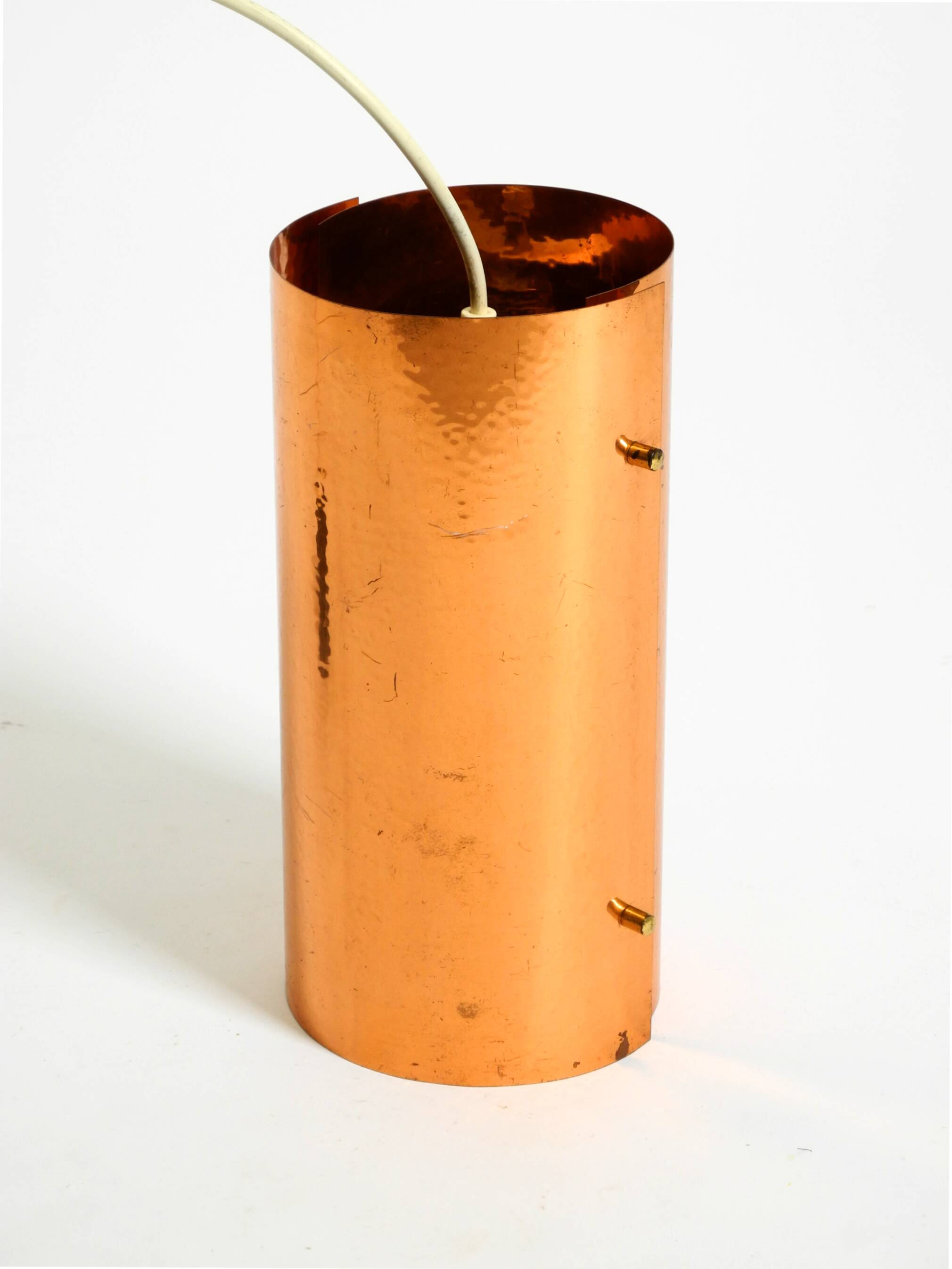 Two 50s tube pendant lamps consisting of two screwed-together copper bowls